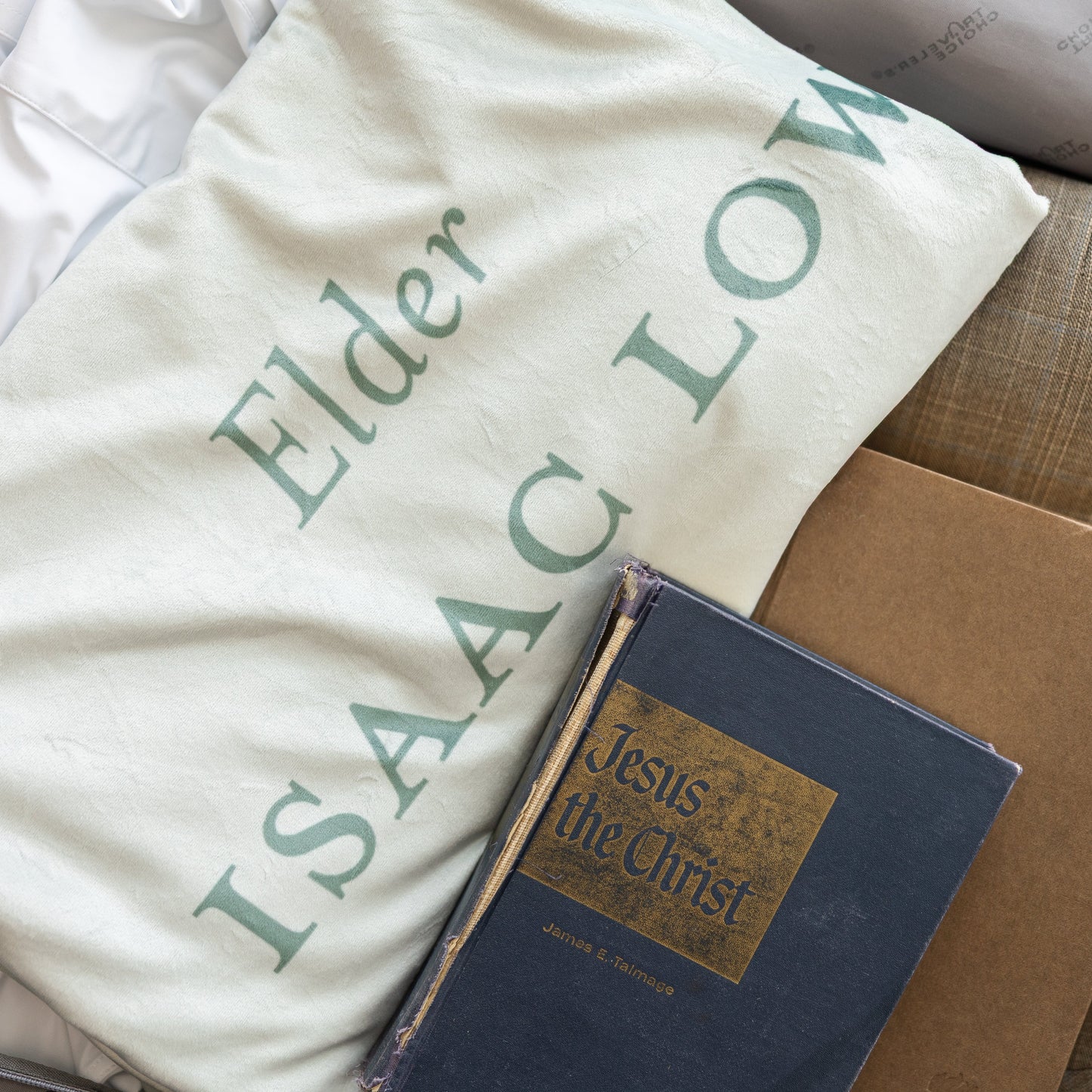The Gathering LDS missionary blanket displayed with scriptures, featuring personalized missionary details and faith-centered artwork.