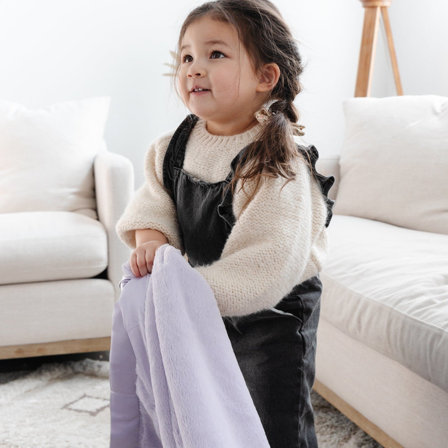 Light purple receiving blanket featuring a gentle, breathable fabric, designed for comforting your kids.