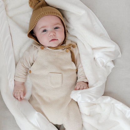 Soft and cozy receiving blanket, perfect for wrapping your baby in gentle warmth.