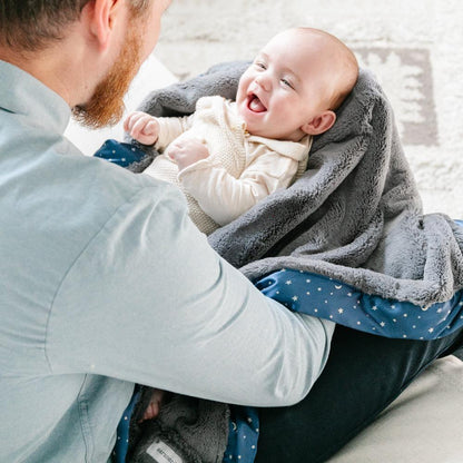 Snuggly receiving blanket with a soft, gentle texture, perfect for wrapping your baby in warmth.